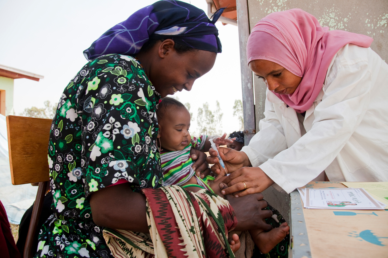 A child is vaccinated by a Health Extension Worker at the Germana Gale Health Post in Ethiopia.