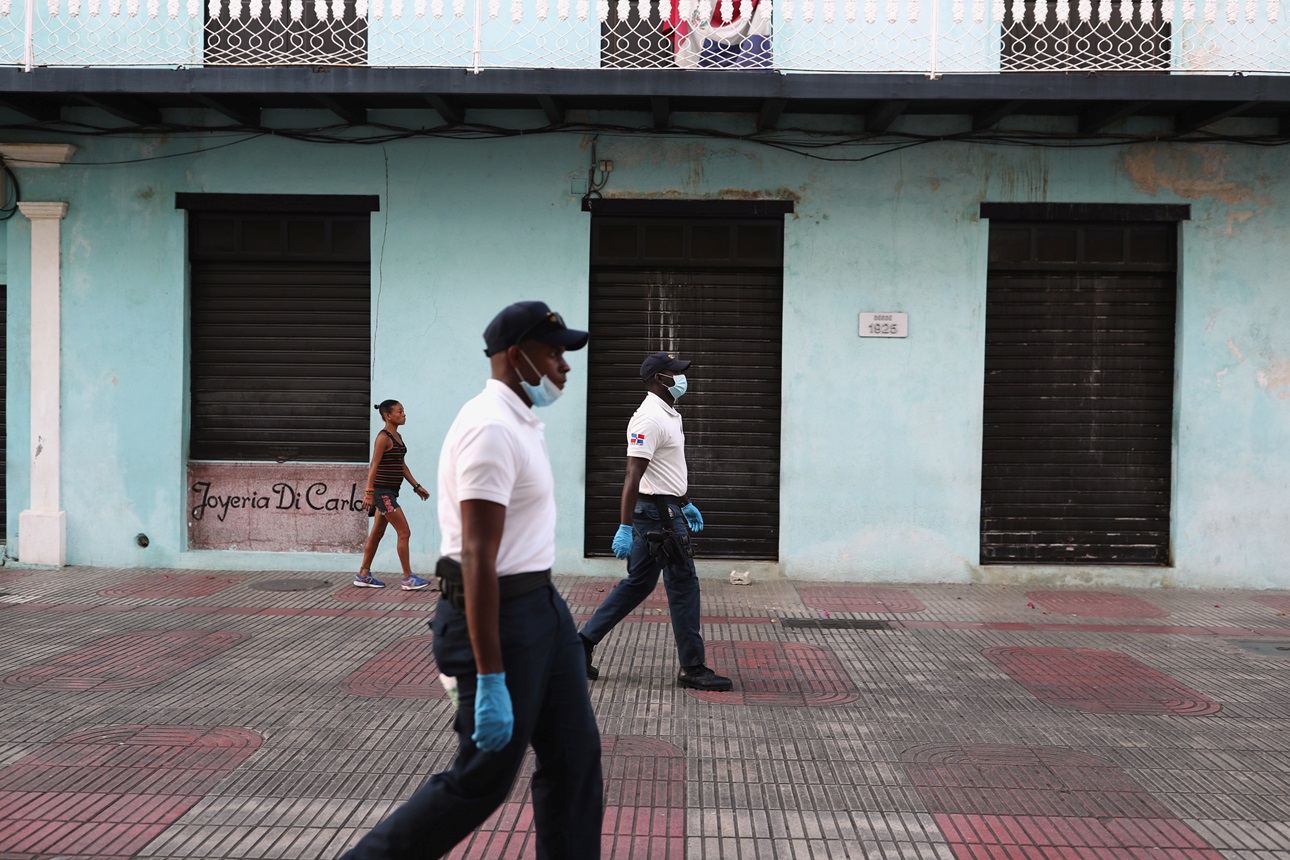 Police patrol the streets after businesses are closed in the colonial district, after a state of emergency decreed by the government, as a preventive measure against the spread of the coronavirus disease (COVID-19), in Santo Domingo, Dominican Republic March 24, 2020. 