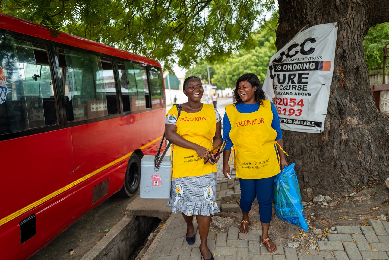 Community health nurses Priscilla Osei and Juliana Akumatey visit homes, schools, bus stations, and wherever they can find people to vaccinate against COVID-19 on June 3, 2022. 