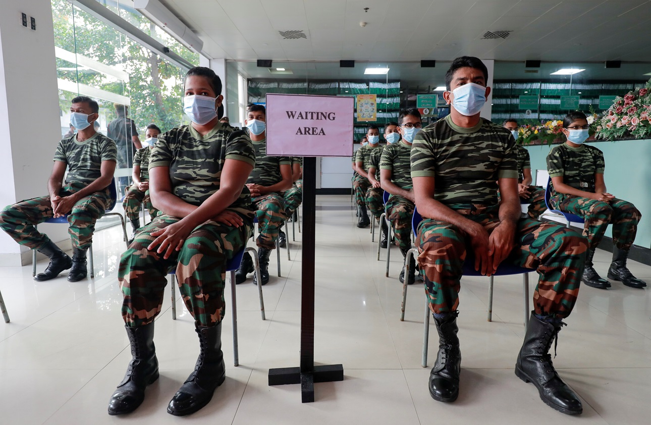 Sri Lankan army members wait to receive a dose of AstraZeneca's COVID-19 vaccine manufactured by the Serum Institute of India, at army hospital in Colombo, Sri Lanka January 29, 2021.