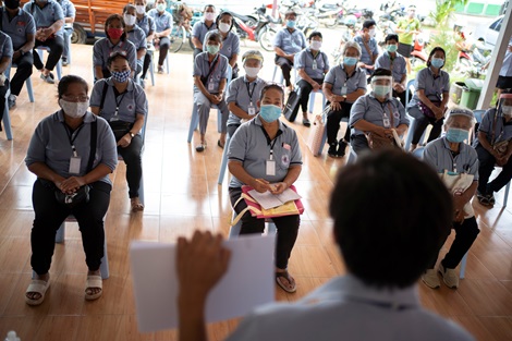 Village health volunteers wearing face masks and shields train before visiting houses to prevent the spread of the coronavirus disease (COVID-19) in Ang Thong province, Thailand, May 27, 2020. Picture taken May 27, 2020. 