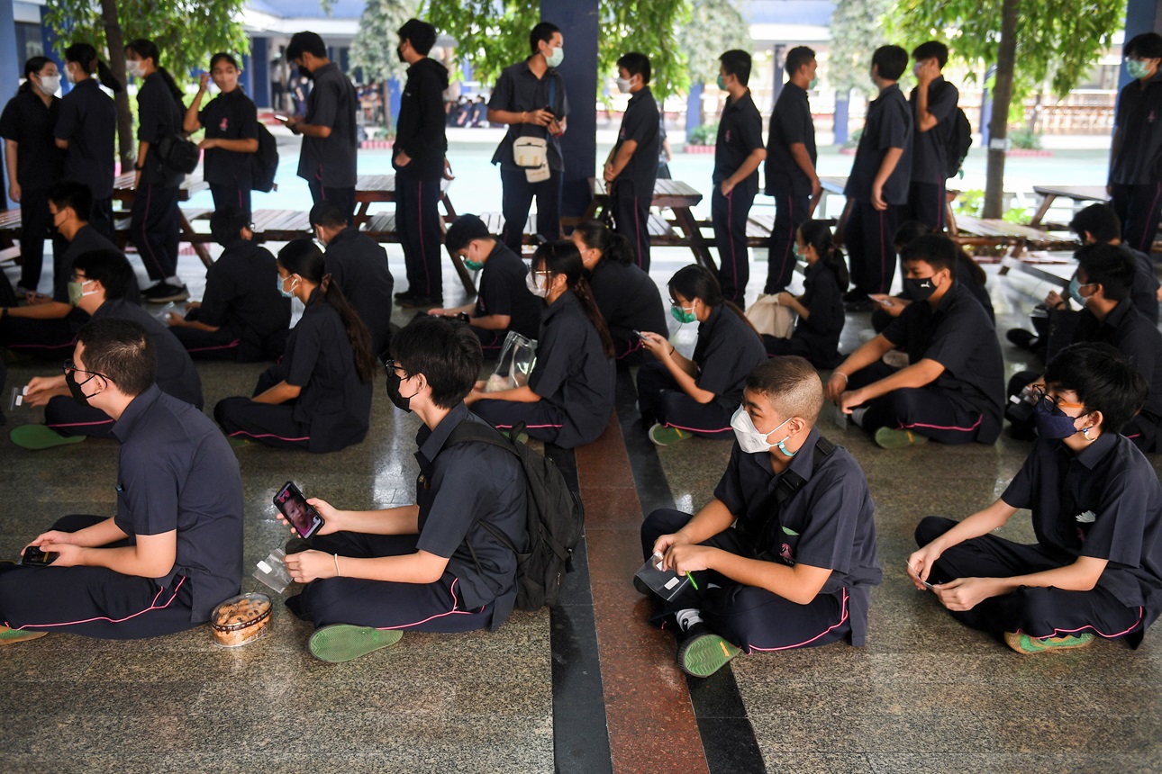 Students queue up to get rapid antigen tests amid the coronavirus disease (COVID-19) outbreak at a school in Bangkok, Thailand, January 13, 2022. 
