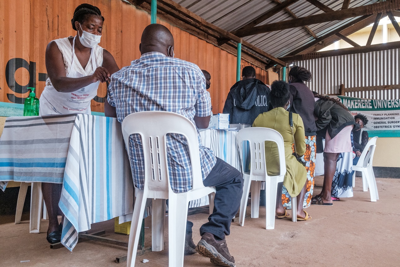 Nurse Rhode Guloba administers a COVID-19 vaccine at the Makerere University Hospital in Kampala, Uganda, on January 19, 2022. 