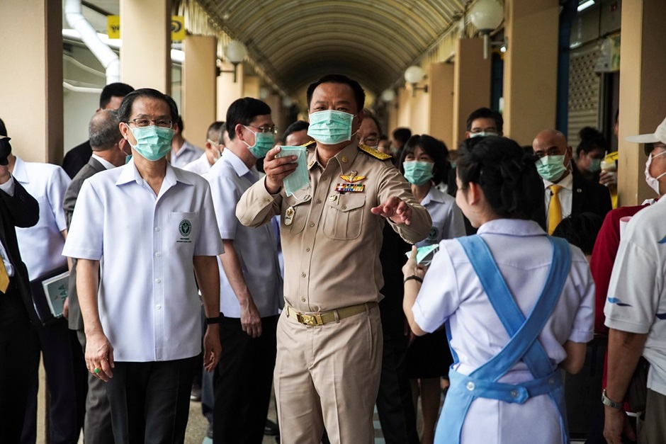 Anutin Charnvirakul, Thailand's Deputy Prime Minister and Minister of Public Health distributes protective face masks in Bangkok, Thailand, February 3, 2020.