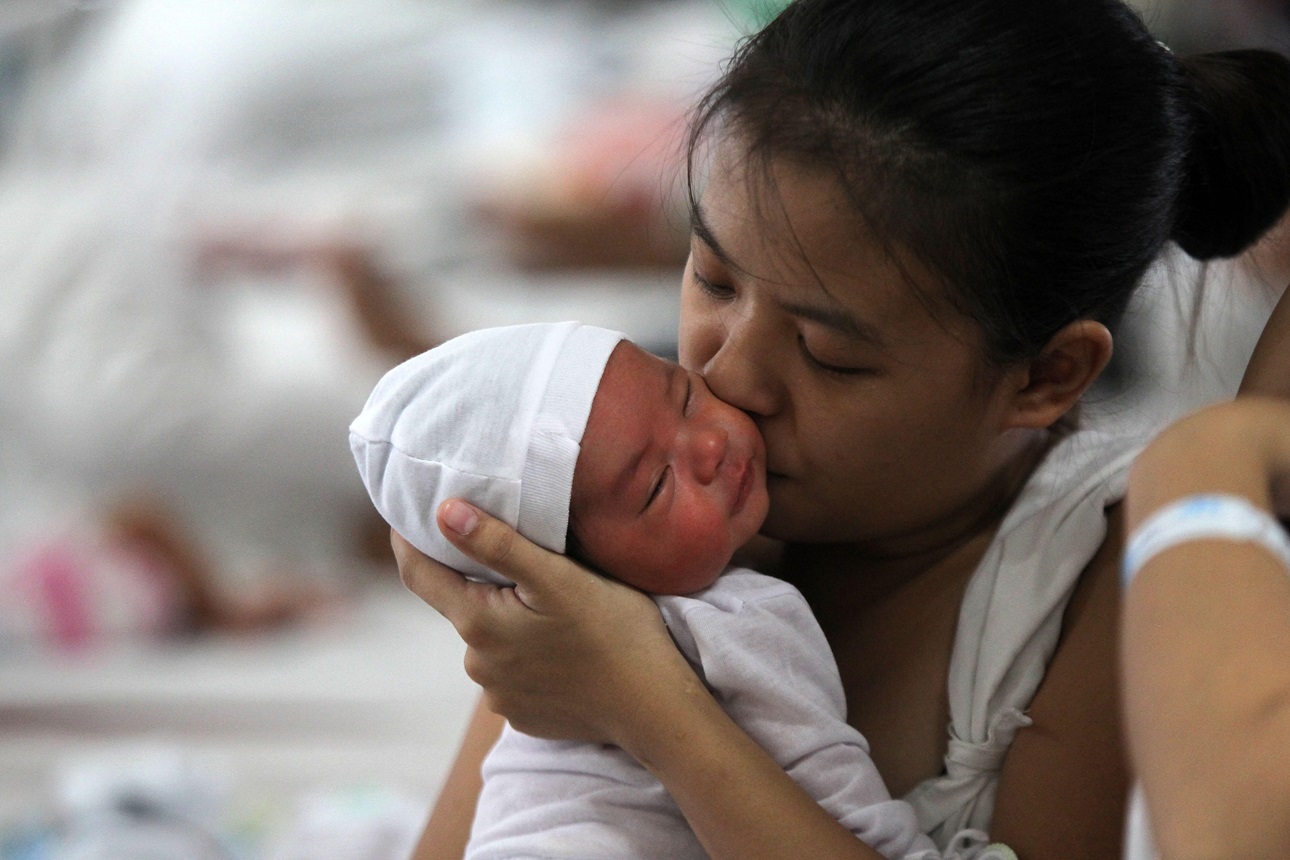 A new mother in the Philippines, one of the countries that has reduced anemia among women of reproductive age.