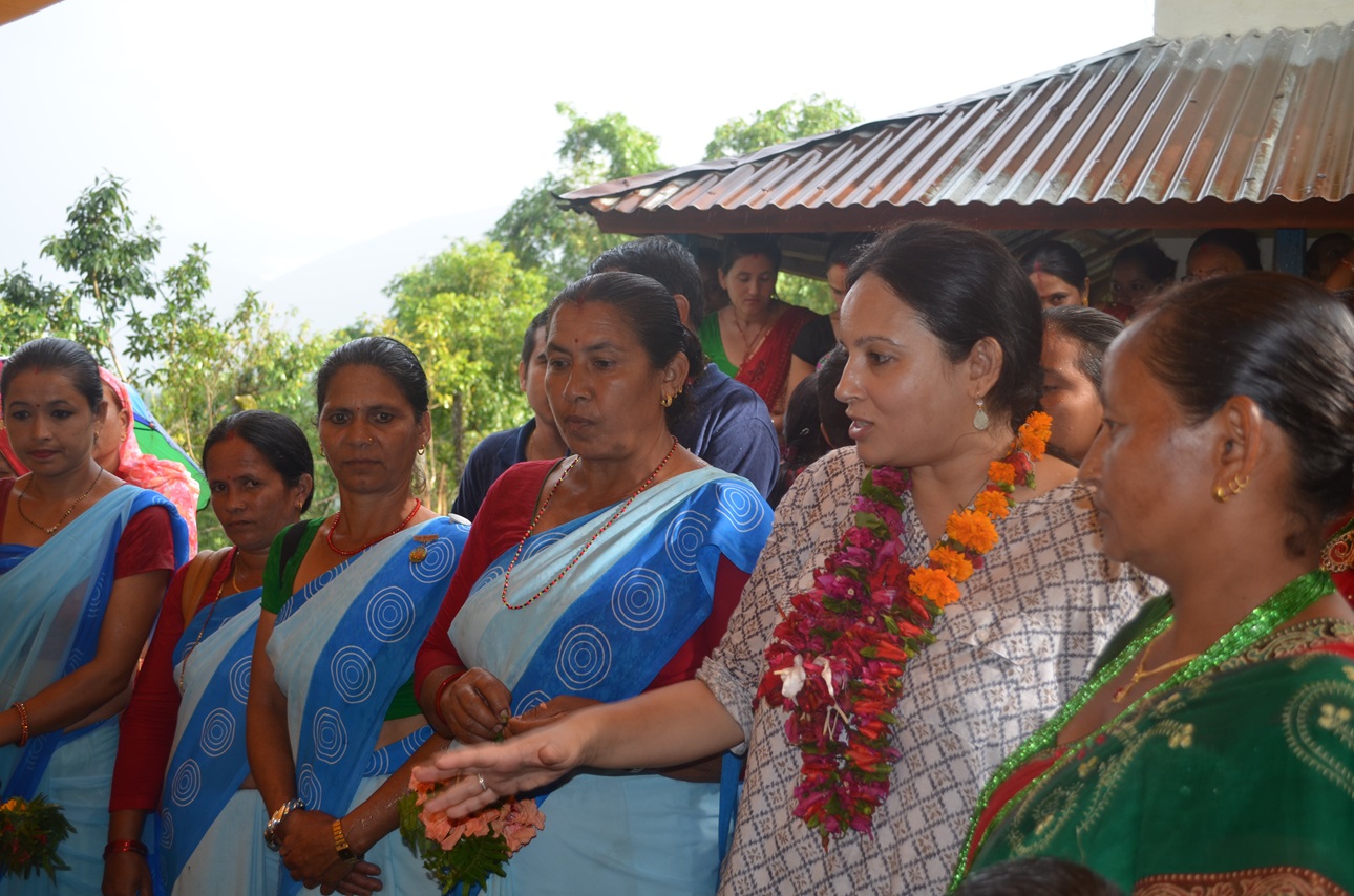 As Chief of Party of the USAID-funded Suaahara II project, Pooja Pandey Rana (wearing flowers), is helping to improve the nutritional status of women and children in 42 underserved rural districts in Nepal.