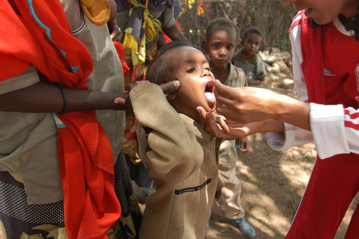 Children being weighed, vaccinated, and administered vitamin supplements in Ererguda village in Ethiopia.