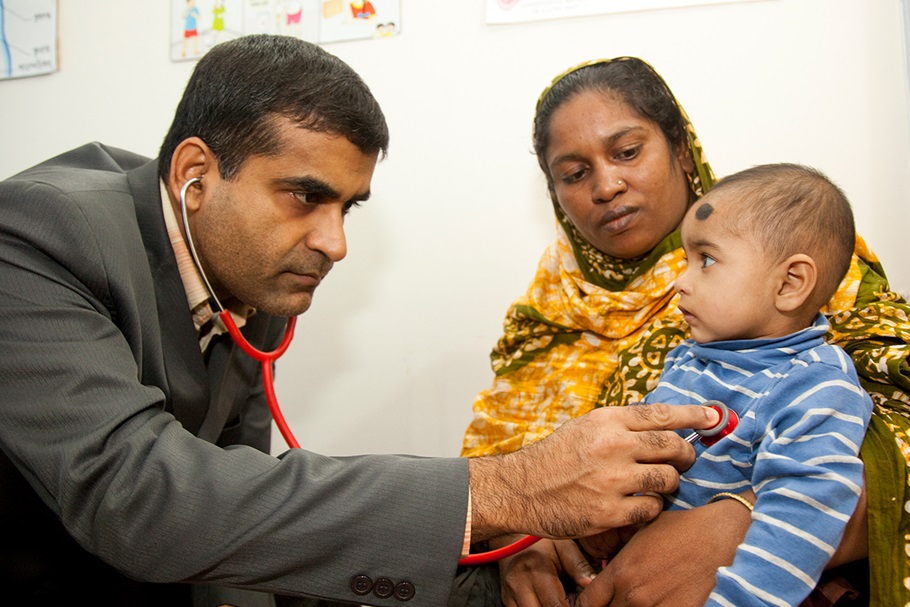 A doctor examines a child as part of a Malnutrition-Enteric Disease Study at the Mal-ED Field office in the Mirpur locality in Bangladesh.