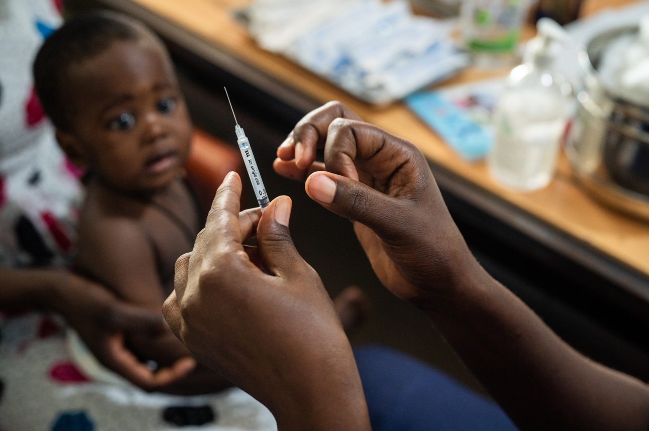 A nurse prepares a syringe of a vaccine at the Philippe Maguilen Senghor Hospital in Dakar, Senegal